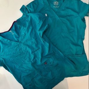 Two scrub shirts